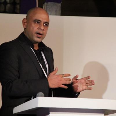 Sameer Sikka speaking at a conference